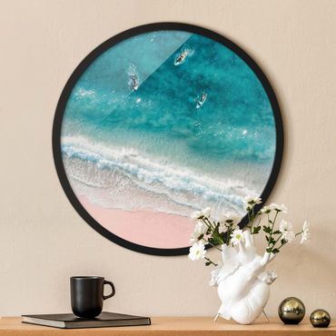 Circular framed print - Three Surfers Paddling To The Shore
