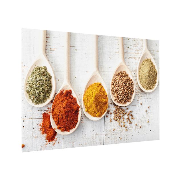 Glass splashback wood Wooden spoons with spices