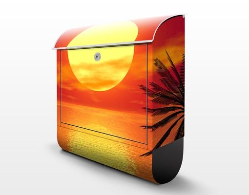 Red wall mounted post box Caribbean sunset