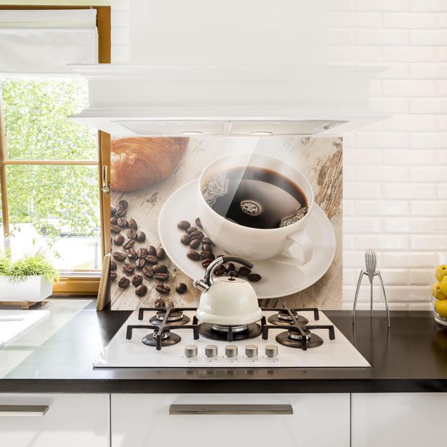 Glass splashback baking and coffee Steaming Coffee Cup With Coffee Beans