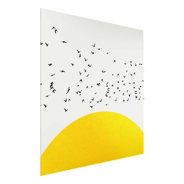 Glass prints landscape Flock Of Birds In Front Of Yellow Sun