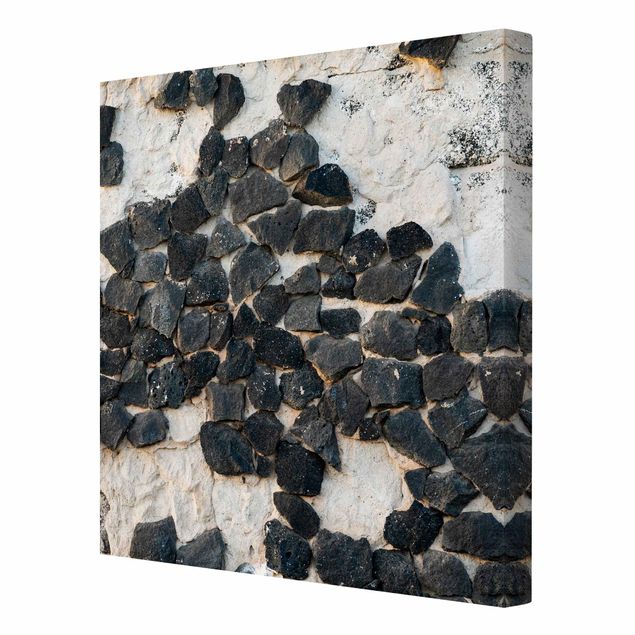Grey prints Wall With Black Stones