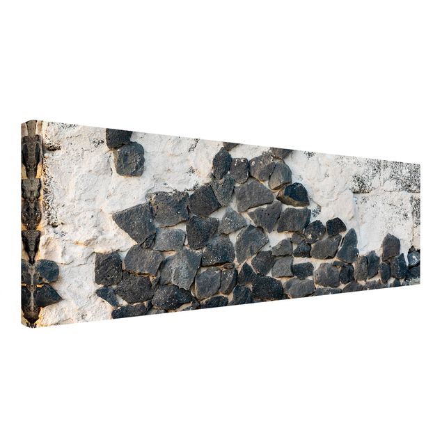 Canvas art Wall With Black Stones