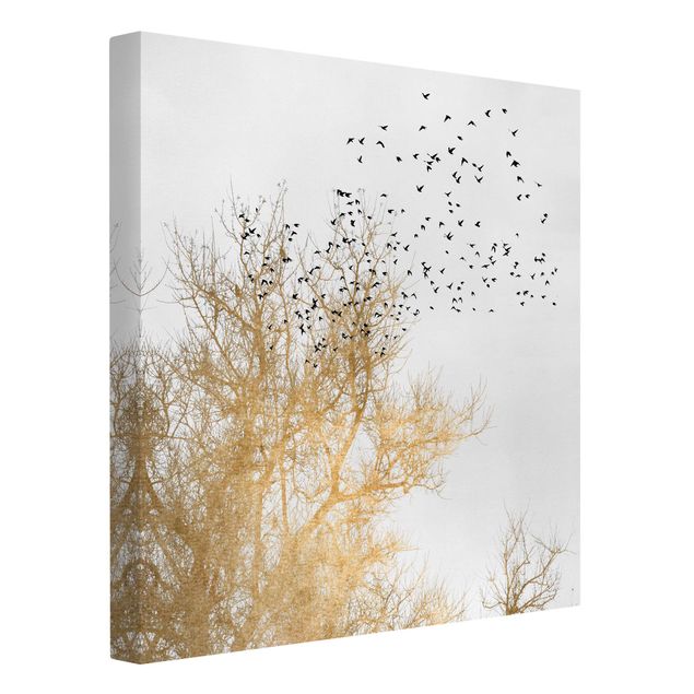 Canvas prints birds Flock Of Birds In Front Of Golden Tree