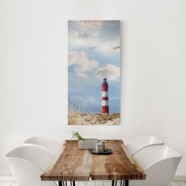 Beach prints Lighthouse Between Dunes