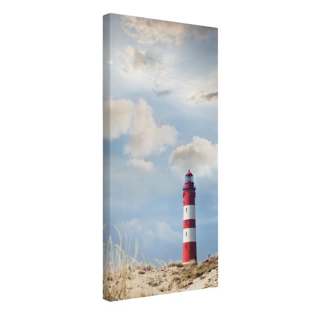 Sea prints Lighthouse Between Dunes