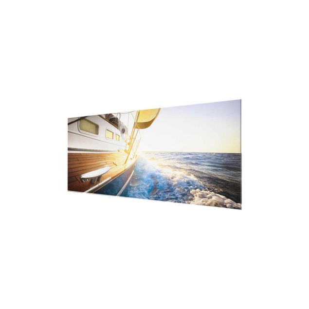 Glass prints beach Sailboat On Blue Ocean In Sunshine