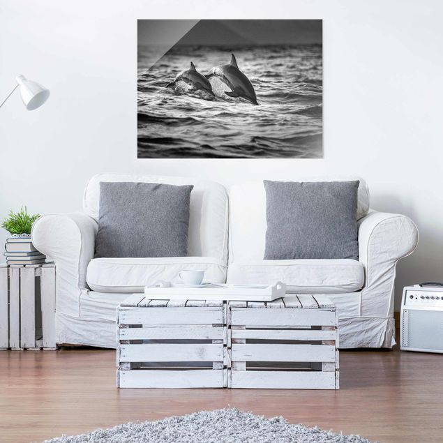 Glass prints black and white Two Jumping Dolphins