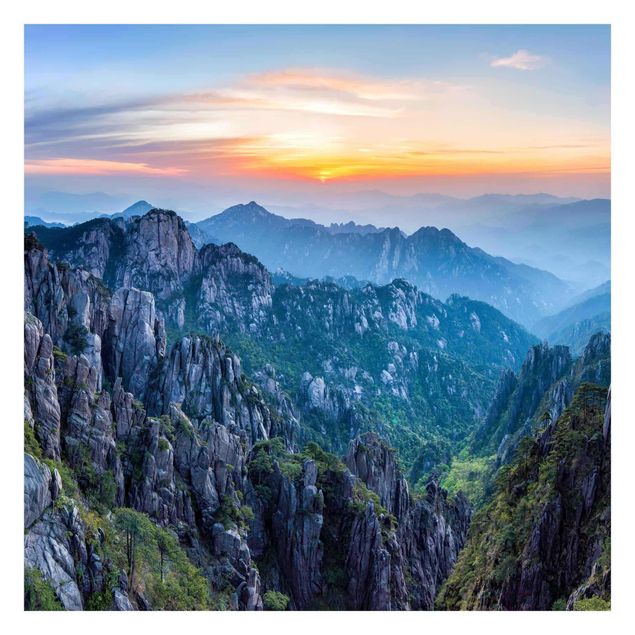 blue wall mural Rising Sun Over The Huangshan Mountains