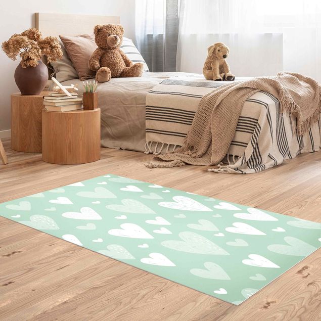 Nursery decoration Small And Big Drawn White Hearts On Green