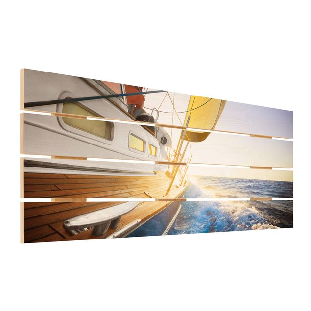 Prints on wood Sailboat On Blue Ocean In Sunshine