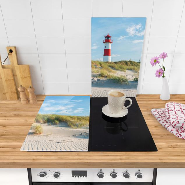 Stove top covers Lighthouse At The North Sea